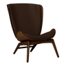 The Conversation Piece leather armchair with natural frame