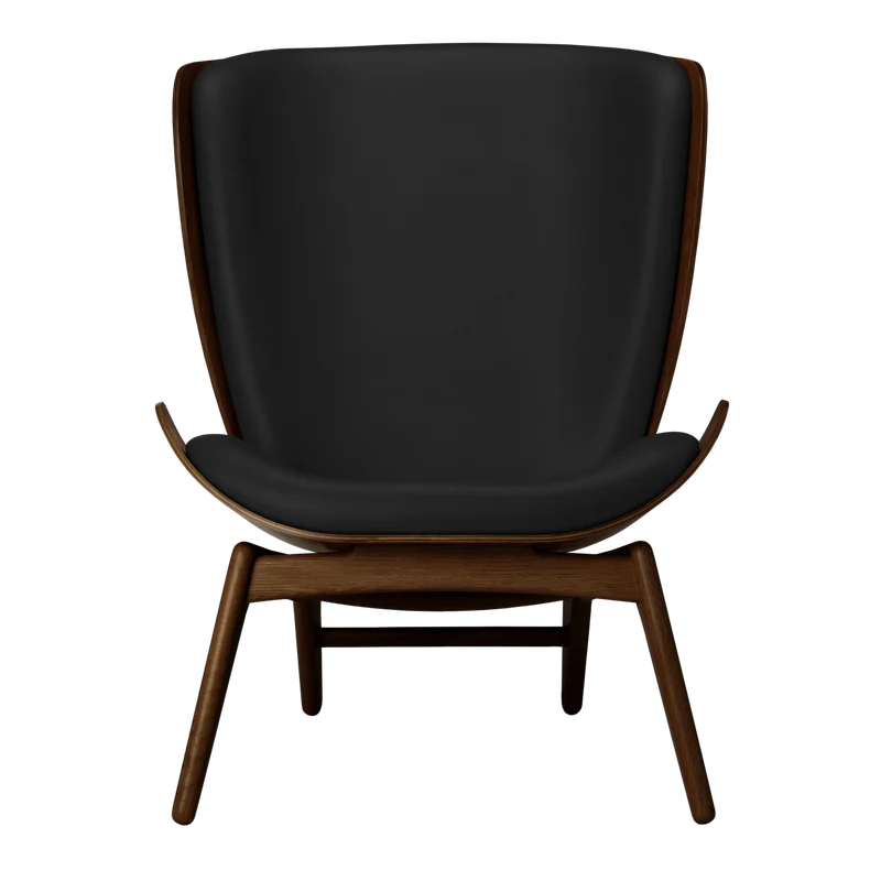 The Conversation Piece leather armchair with natural frame