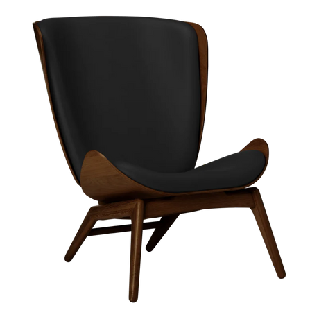 The Conversation Piece leather armchair with natural frame